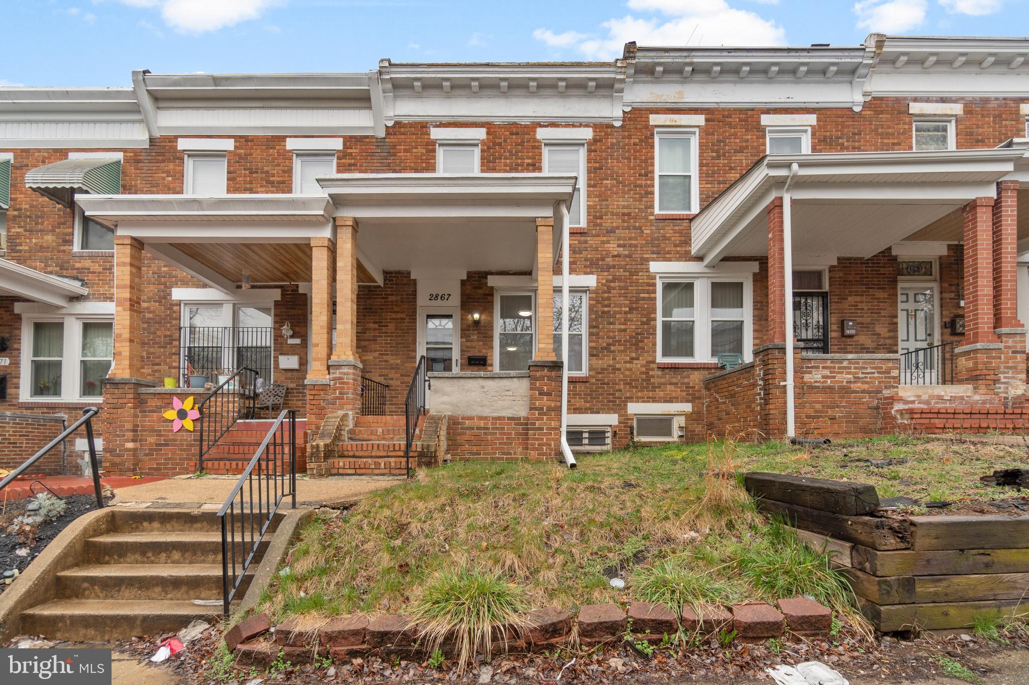 2867 Mayfield Avenue Baltimore, MD 21213 - Photo 24 of 25 front view of a building with a yard