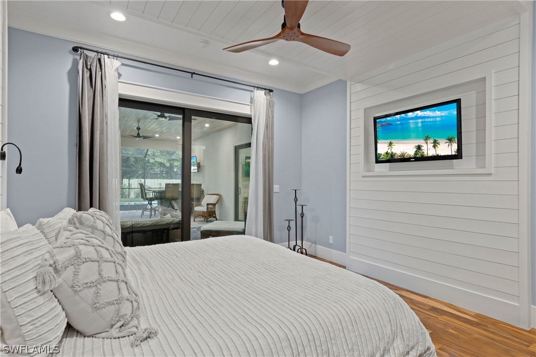 1606 Ardmore Road Fort Myers, FL 33901 - Photo 19 of 33 a bedroom with a large bed and a large window