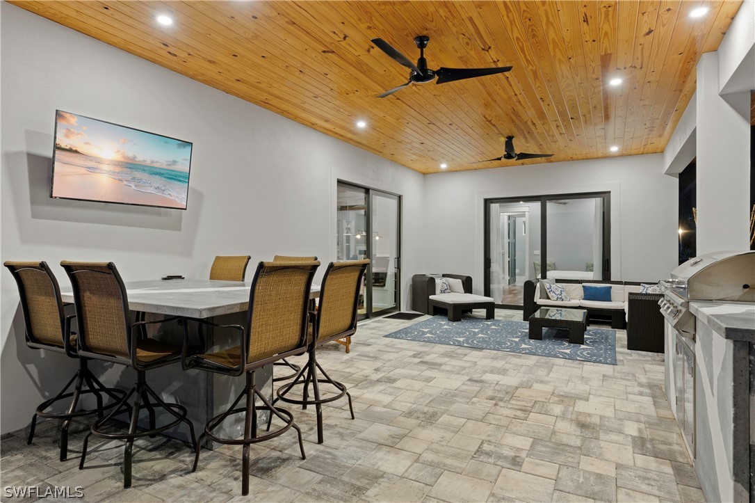 1606 Ardmore Road Fort Myers, FL 33901 - Photo 27 of 33 a view of a dining room with furniture window and outside view