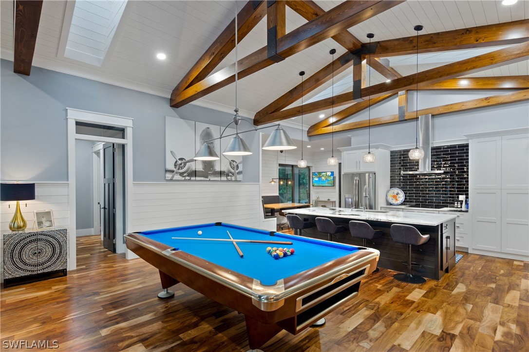 1606 Ardmore Road Fort Myers, FL 33901 - Photo 10 of 33 a room with furniture pool table and wooden floor