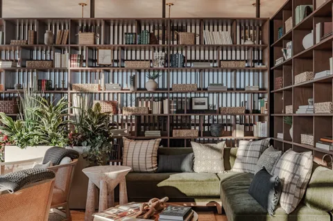 a terrace with outdoor seating and city view