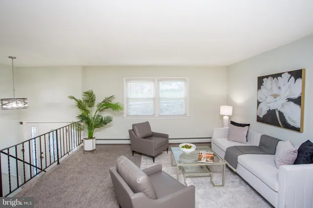 a kitchen with a counter space a sink appliances and a window
