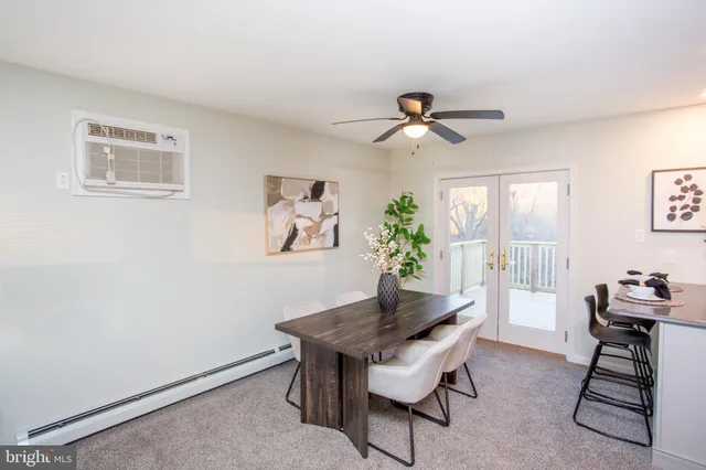 a kitchen with stainless steel appliances a stove sink and cabinets