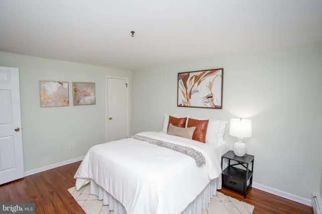 a view of a house with a yard and garage