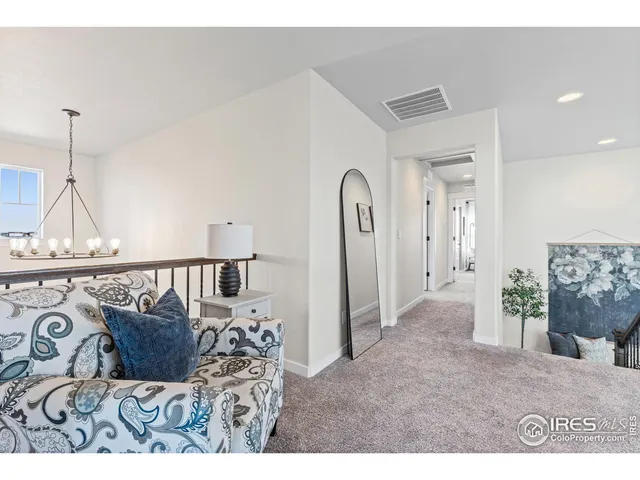 a view of a furniture in a living room