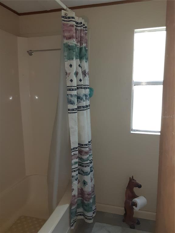 8333 Kathleen Road Lakeland, FL 33810 - Photo 14 of 24 a room with toys and a potted plant