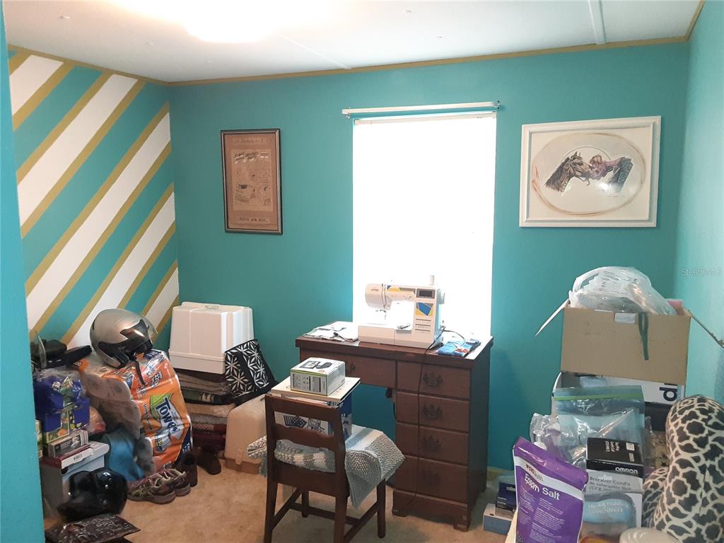 8333 Kathleen Road Lakeland, FL 33810 - Photo 15 of 24 a room with furniture and a window