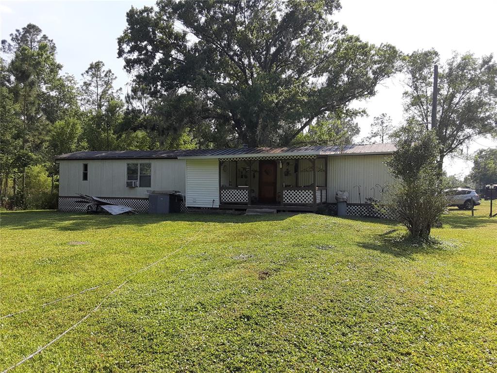 8333 Kathleen Road Lakeland, FL 33810 - Photo 17 of 24 a view of a backyard