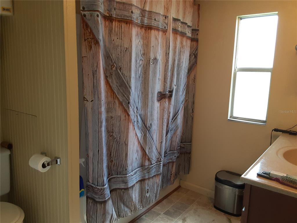 8333 Kathleen Road Lakeland, FL 33810 - Photo 10 of 24 a view of walk in closet with window
