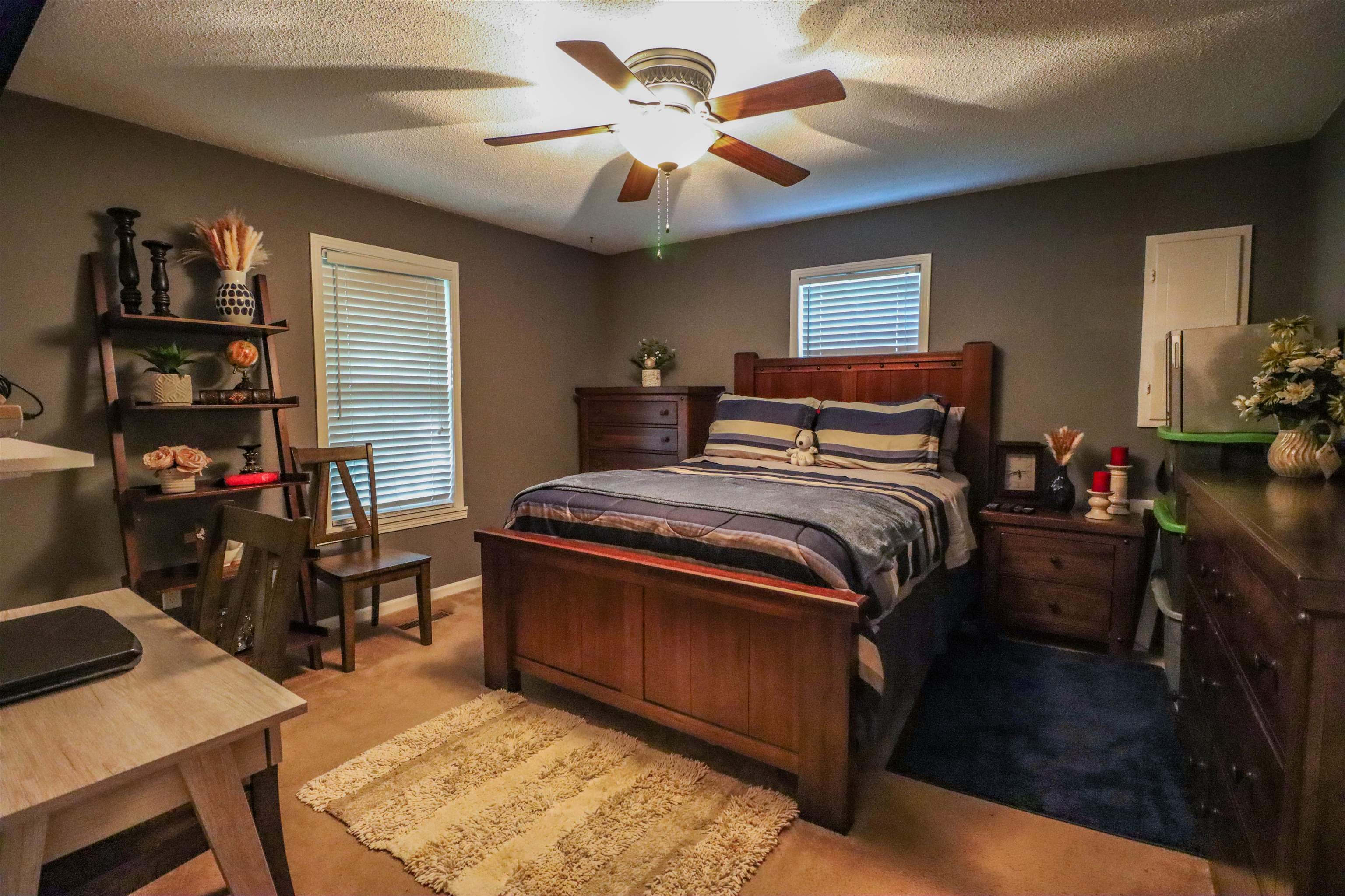 3758 Craig Road Ripley, TN 38063 - Photo 14 of 37 a bedroom with a bed and a desk in it
