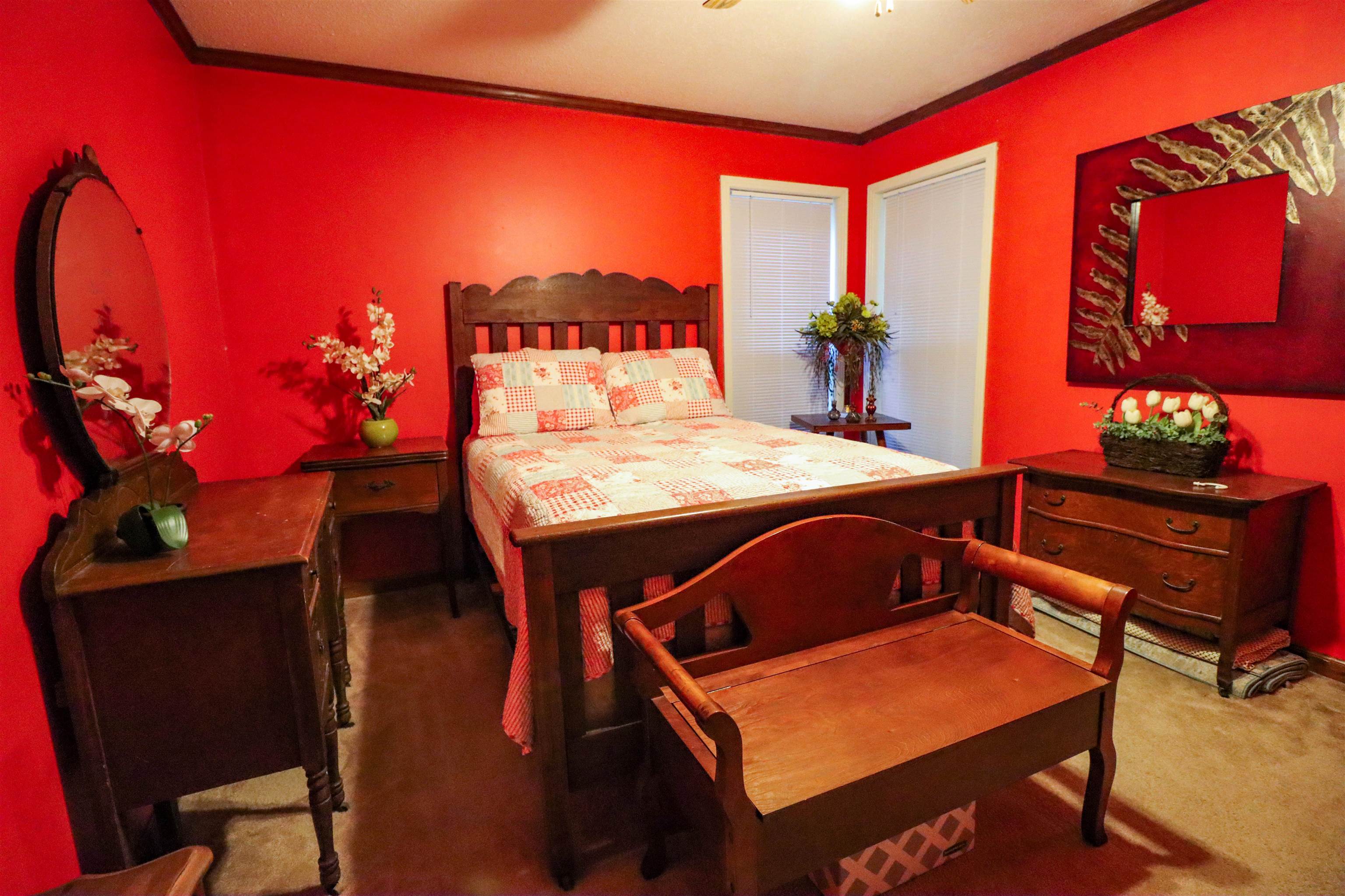 3758 Craig Road Ripley, TN 38063 - Photo 17 of 37 a view of a dining room with furniture and a potted plant