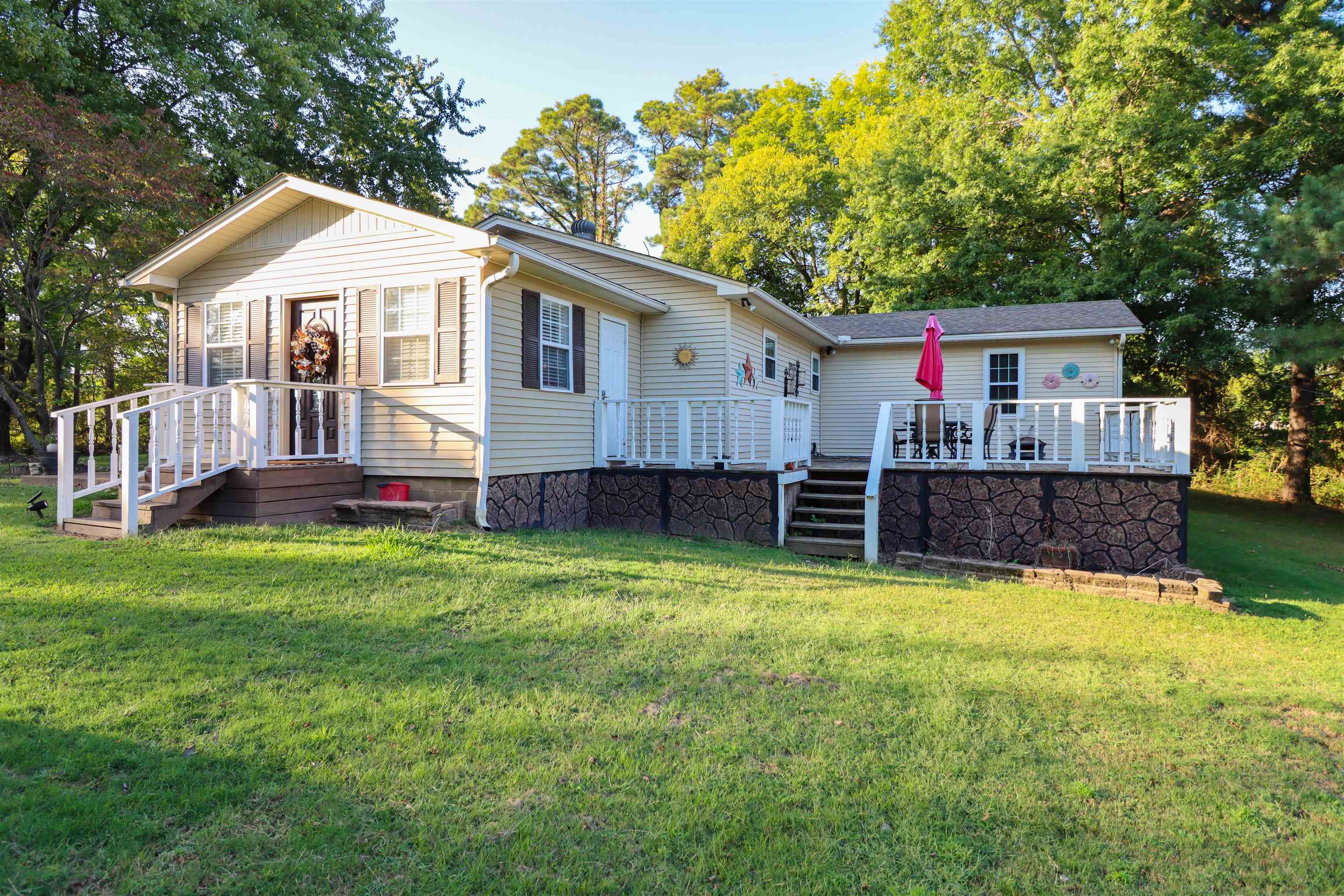 3758 Craig Road Ripley, TN 38063 - Photo 23 of 37 a view of a house with a yard and sitting area