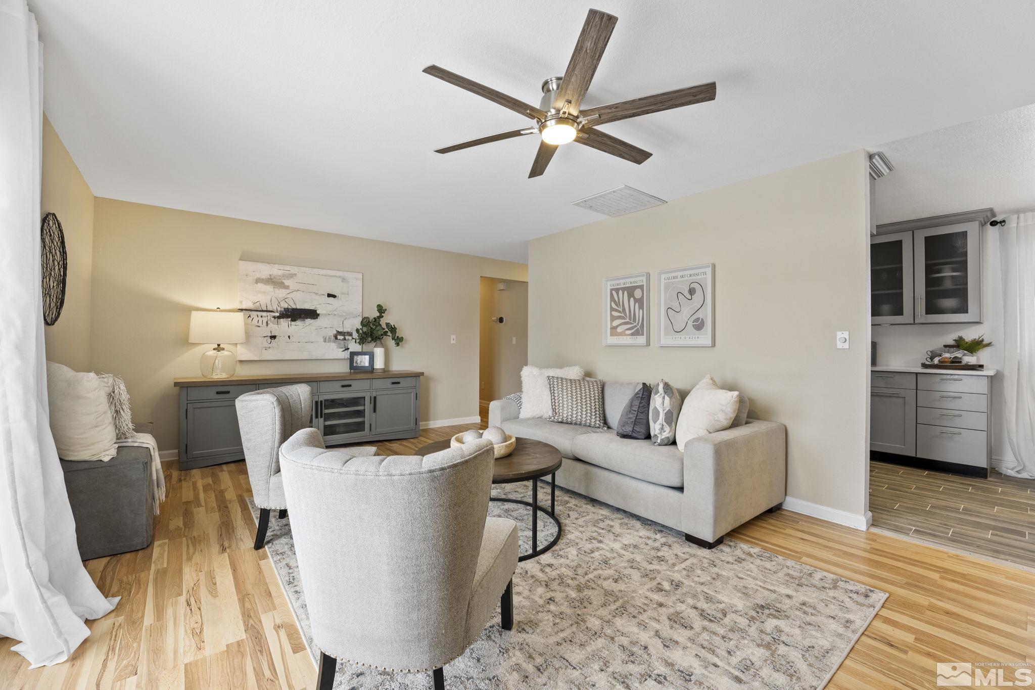 14070 Tourmaline Drive Reno, NV 89521 - Photo 5 of 39 a living room with furniture and a view of kitchen