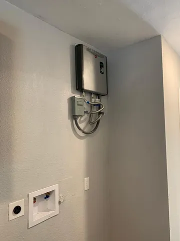 a room with a mirror and a wooden floor