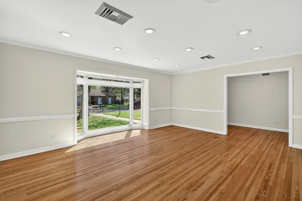 a kitchen with stainless steel appliances white cabinets and a sink
