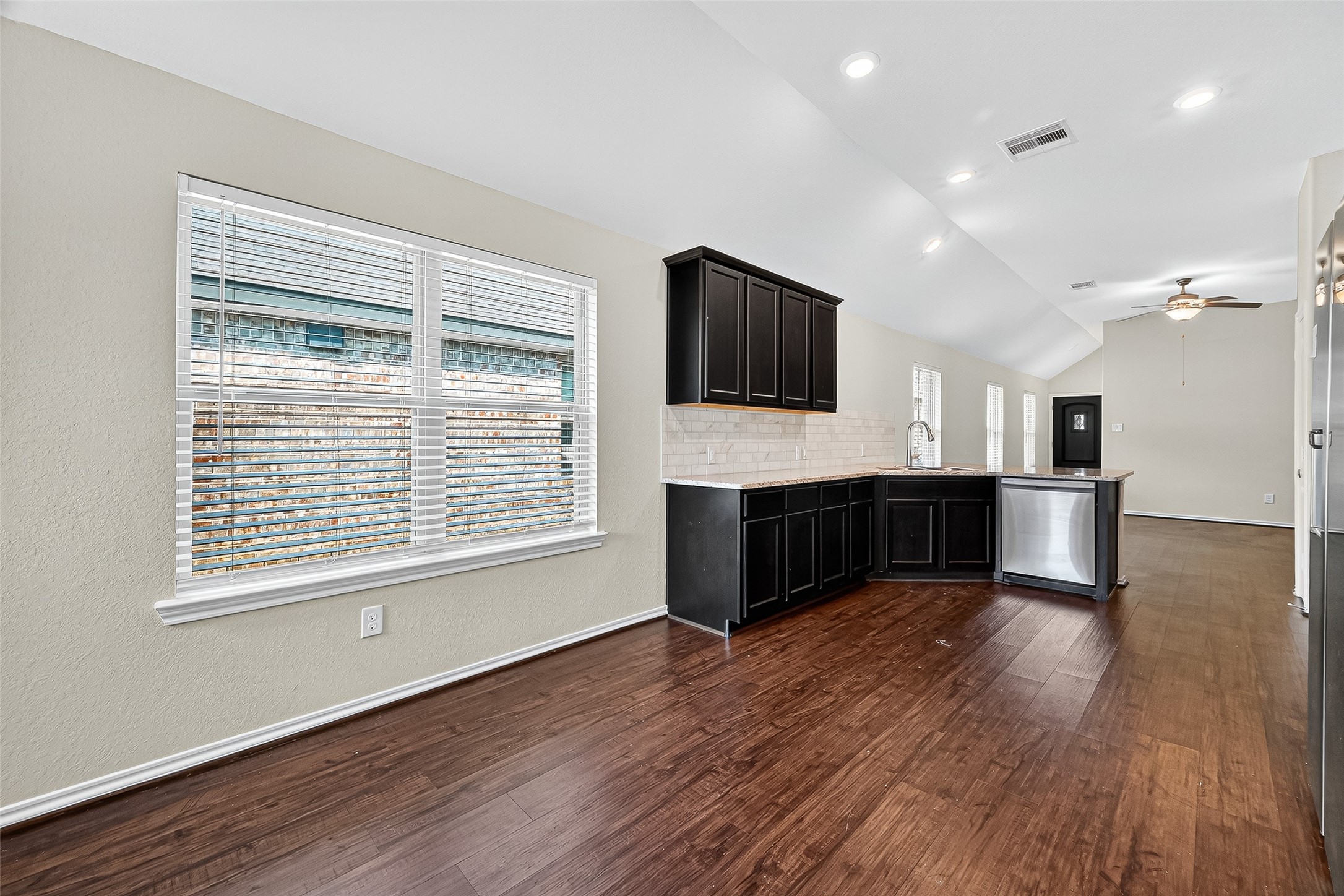 5603 Savanna Pasture Road Katy, TX 77493 - Photo 10 of 29 a living room with a fireplace furniture and a flat screen tv