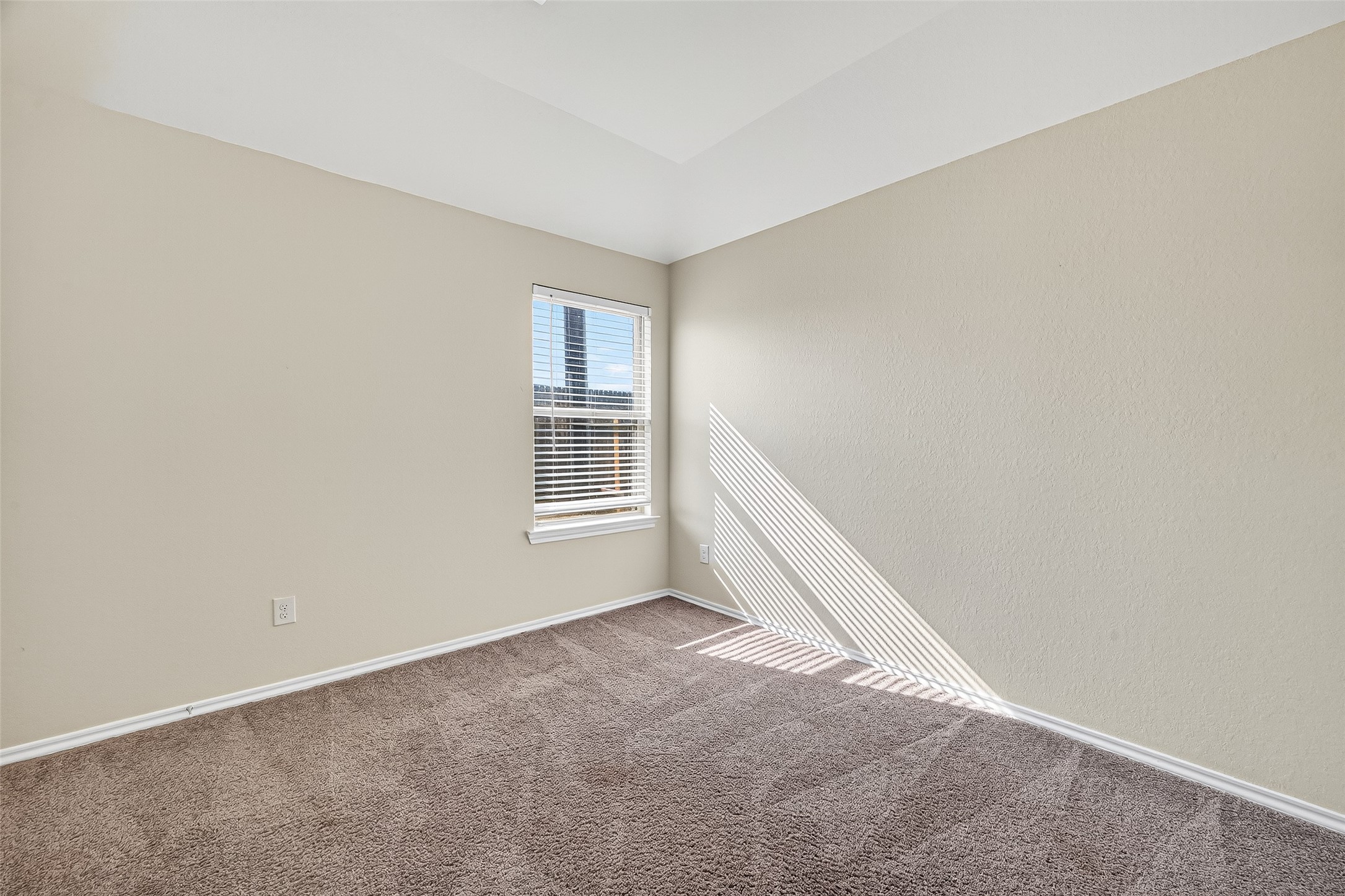 5603 Savanna Pasture Road Katy, TX 77493 - Photo 14 of 29 a view of an empty room with a window