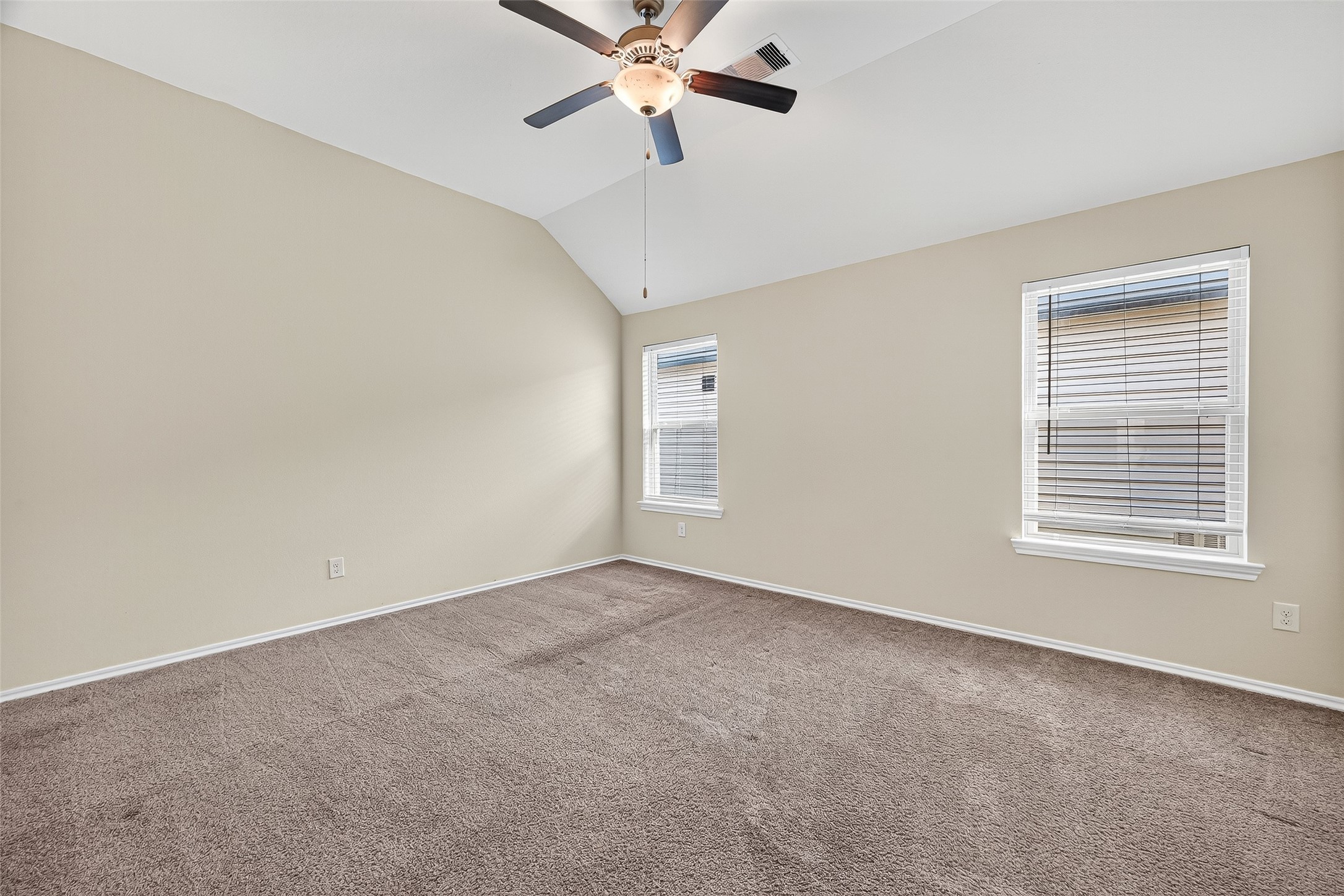 5603 Savanna Pasture Road Katy, TX 77493 - Photo 22 of 29 a view of an empty room with a window