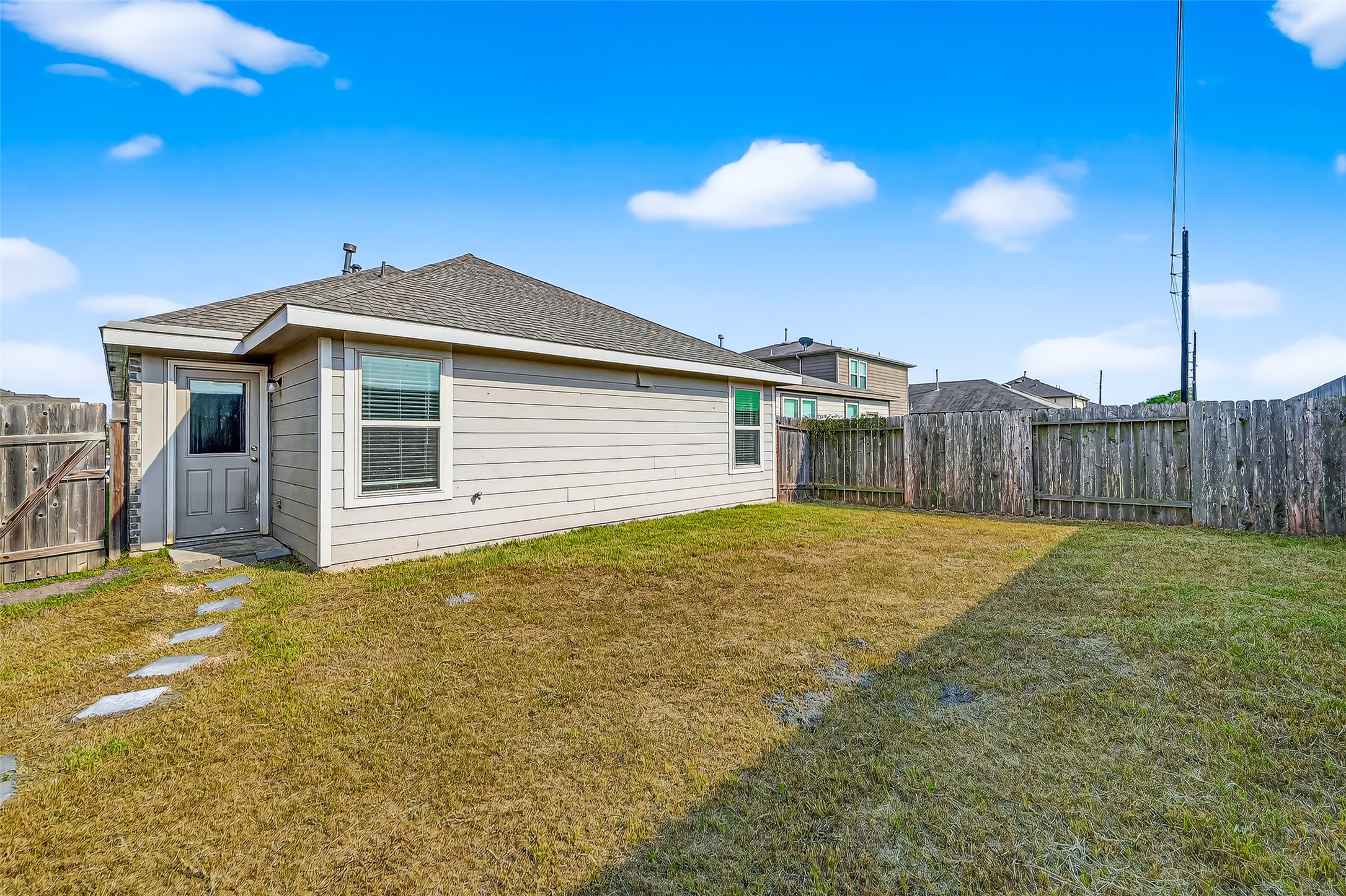 5603 Savanna Pasture Road Katy, TX 77493 - Photo 27 of 29 a front view of a house with a yard