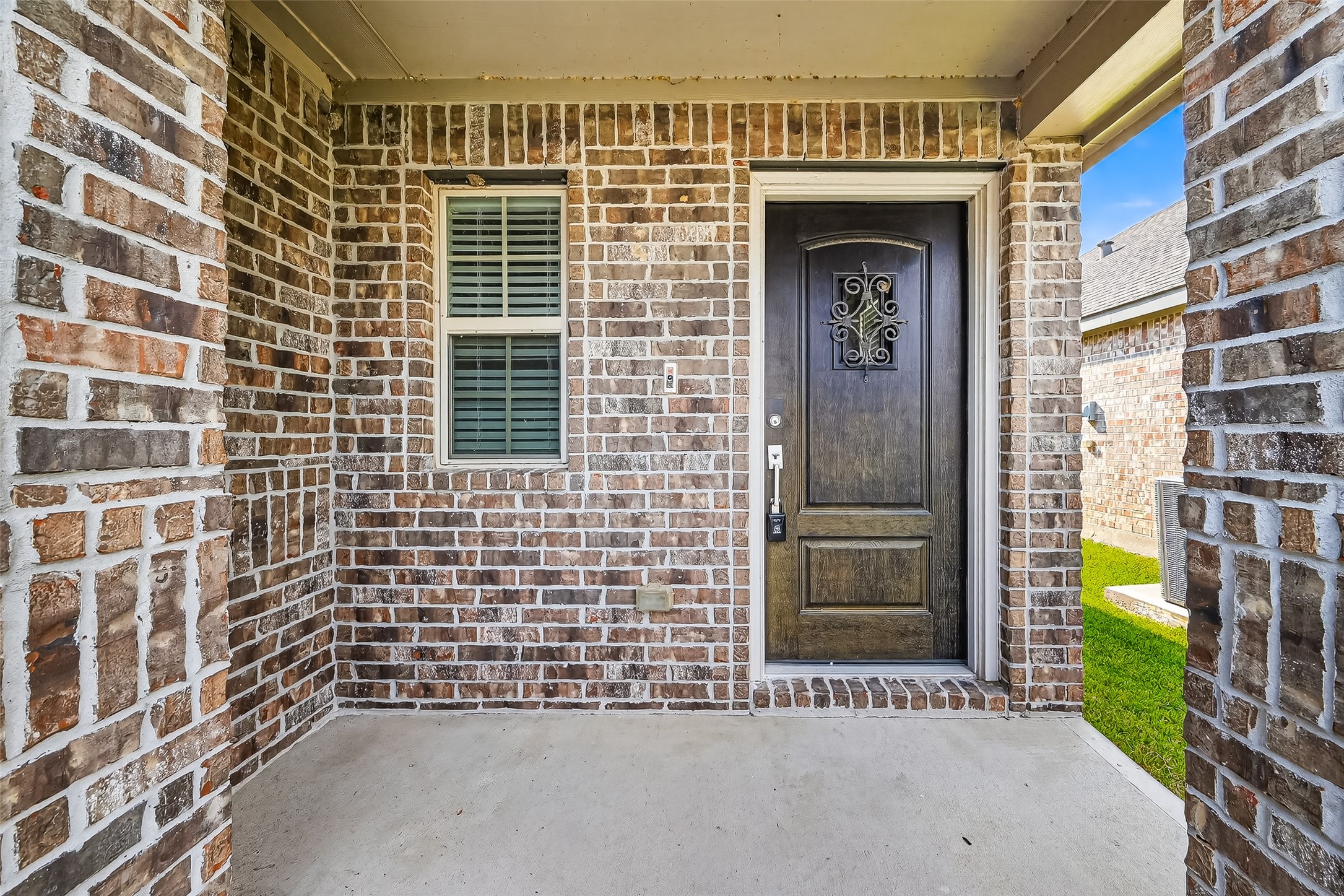 5603 Savanna Pasture Road Katy, TX 77493 - Photo 2 of 29 a view of a door with brick wall
