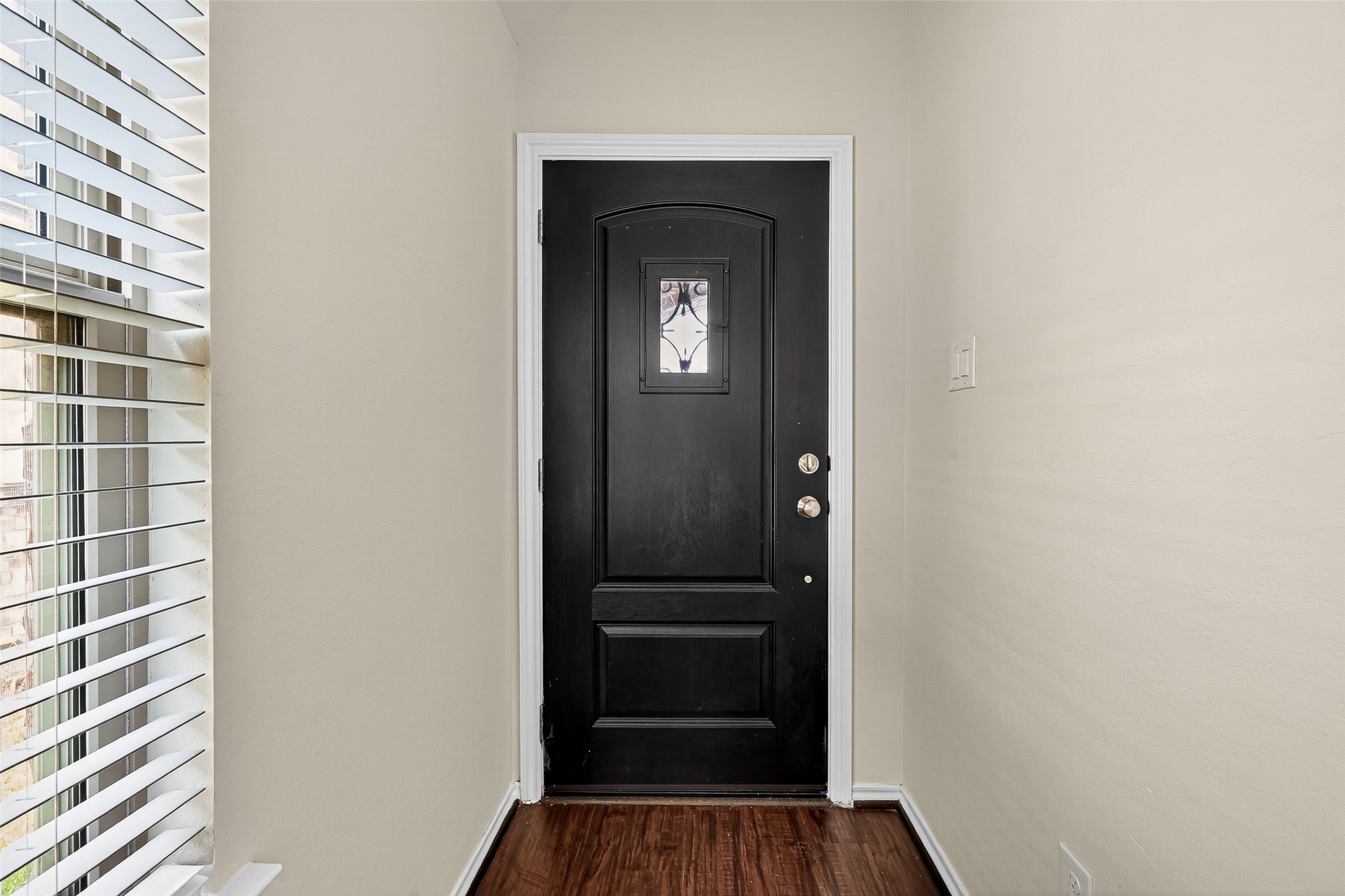 5603 Savanna Pasture Road Katy, TX 77493 - Photo 3 of 29 a view of a hallway with wooden floor