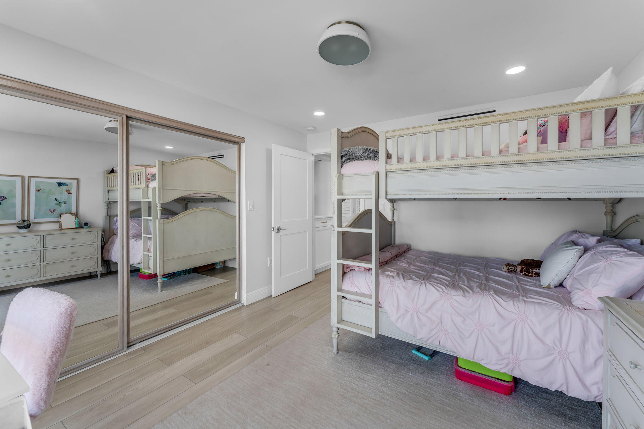 Undisclosed Address Key Largo, FL 33037 - Photo 19 of 56 a bedroom with a bed and a walk in closet