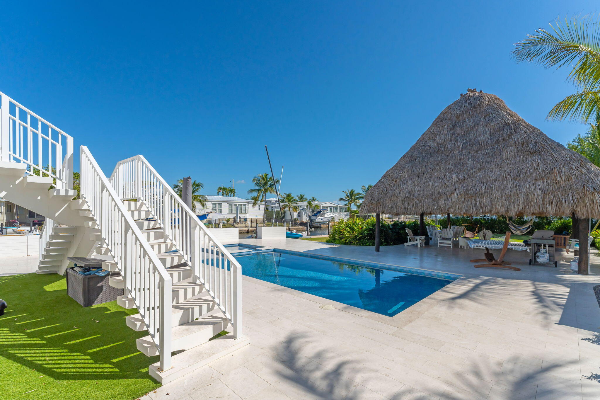 Undisclosed Address Key Largo, FL 33037 - Photo 40 of 56 a view of a house with patio