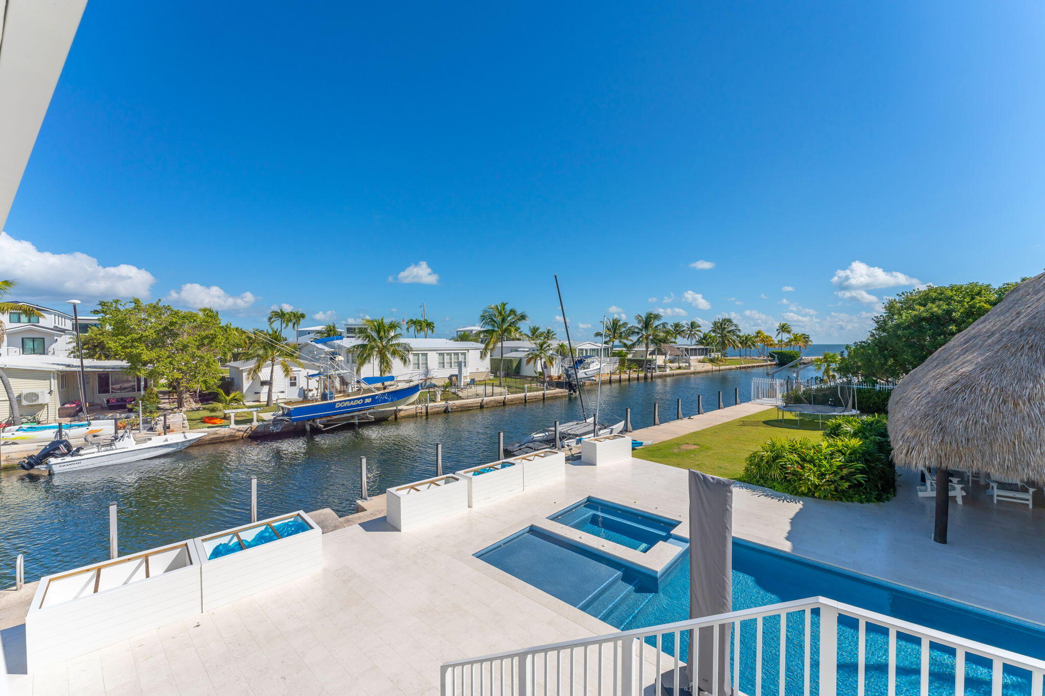 Undisclosed Address Key Largo, FL 33037 - Photo 41 of 56 a view of a lake with a house