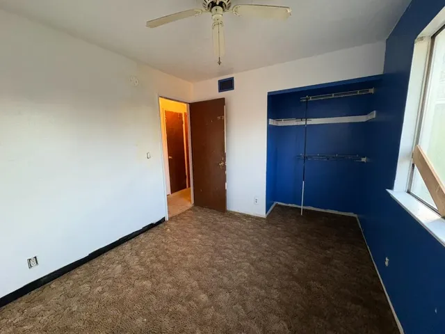 a bathroom with a sink a toilet and tub