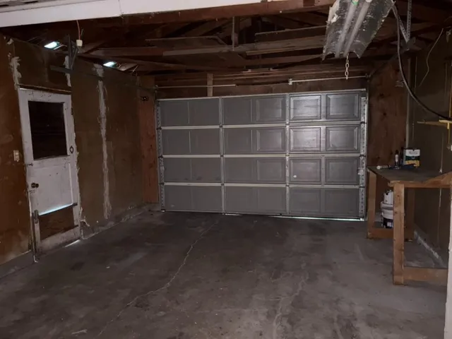 a view of room with a flat screen tv