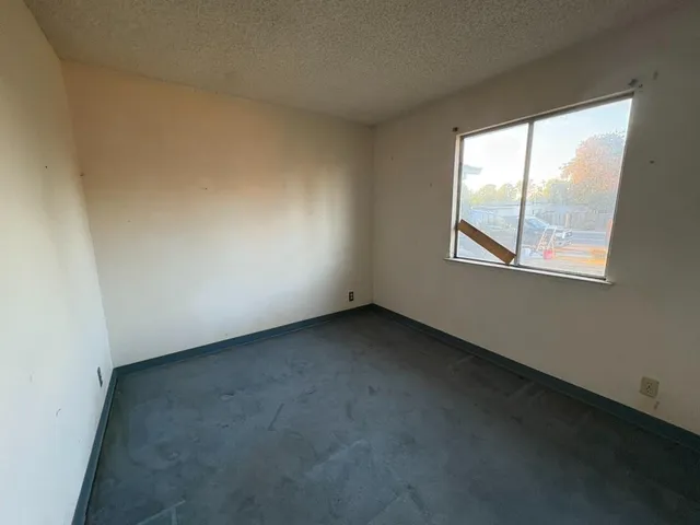 an empty room with a window