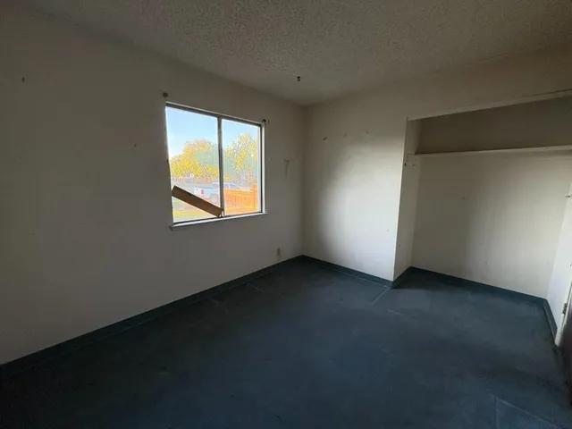 an empty room with a window