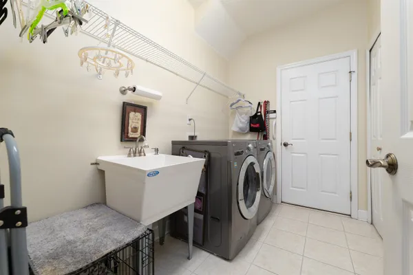 a utility room with dryer and washer