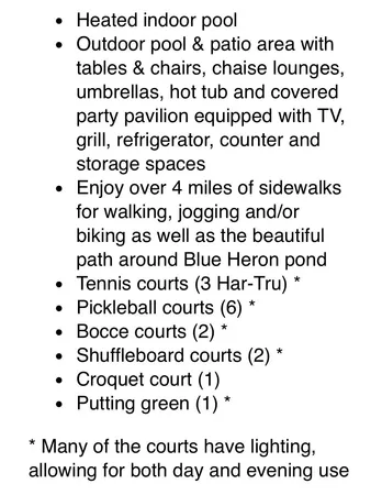 a view of a patio with table and chairs and potted plants