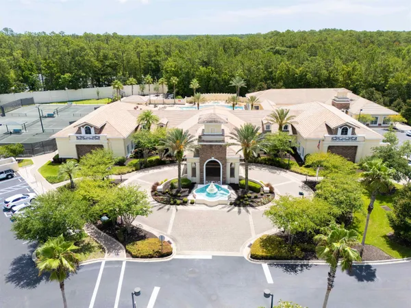 a view of a backyard with a patio