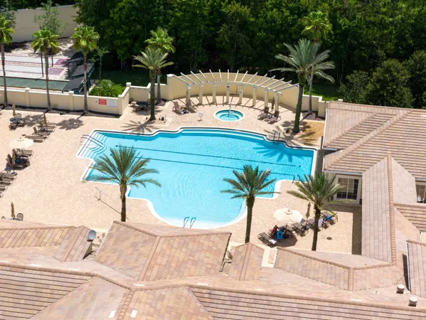 a view of a swimming pool with a patio