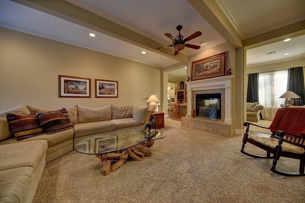8456 Schuster Road Ledbetter, TX 78946 - Photo 18 of 49 a living room with furniture and a fireplace
