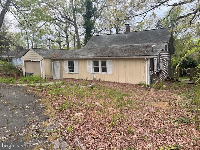 18506 Triangle Street Triangle, VA 22172 - Photo 3 of 19 a front view of house with yard and trees