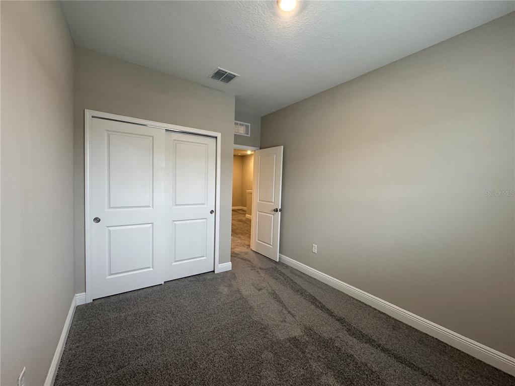 16434 Hamlin Hills Road Winter Garden, FL 34787 - Photo 33 of 50 a view of an empty room