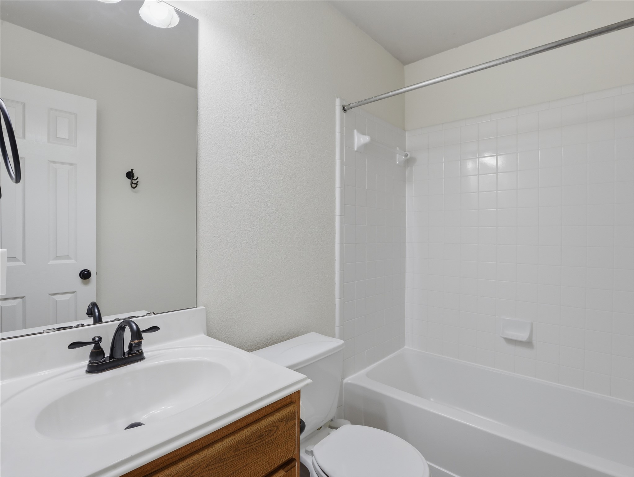 168 Keystone Loop Kyle, TX 78640 - Photo 18 of 23 Full bathroom with vanity and shower / bath combination