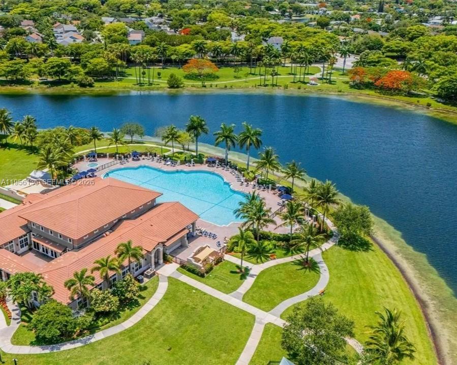 22441 Southwest 88th Place, Unit 2015 Cutler Bay, FL 33190 - Photo 15 of 19 an aerial view of a house with a swimming pool and outdoor seating