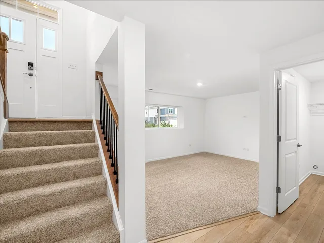 a view of an entryway with stairs