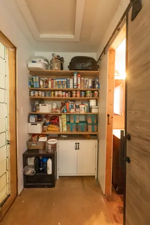a room with storage and utility