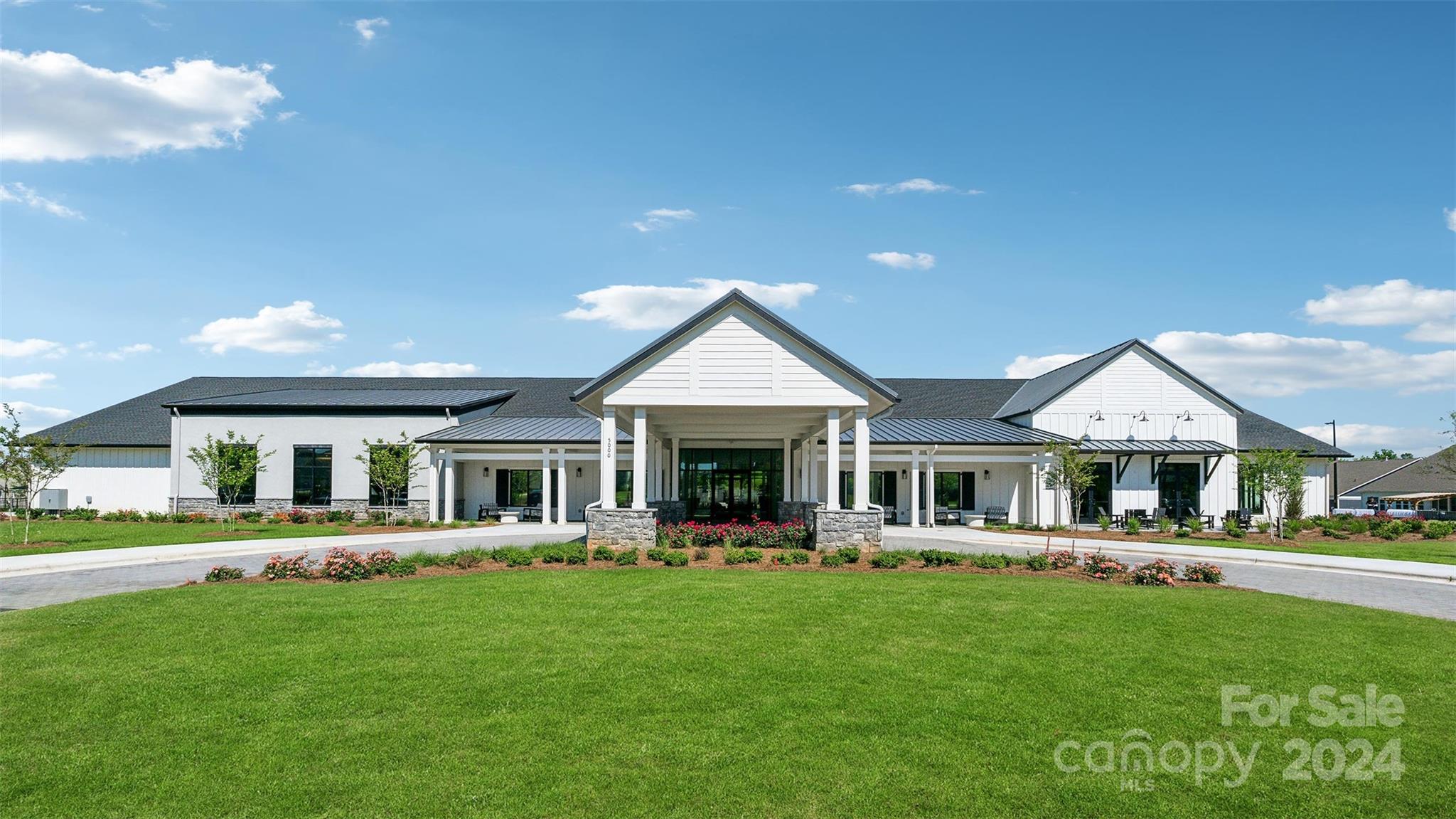 2002 Lake Como Drive Monroe, NC 28110 - Photo 34 of 40 a front view of a house with a yard table and chairs