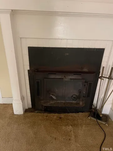 a living room with a fireplace
