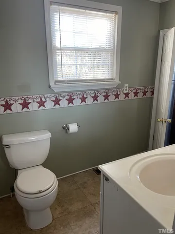 a bathroom with a sink and a toilet