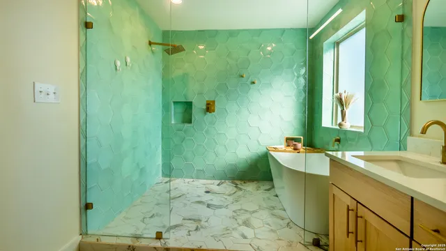 a bathroom with a sink and a mirror