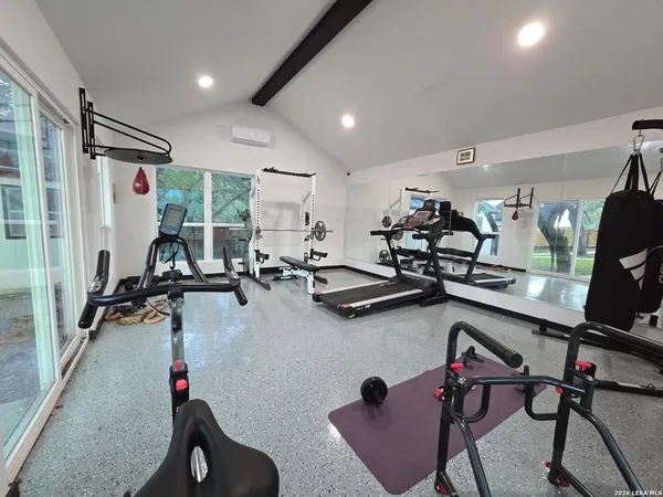 a view of a room with gym equipment