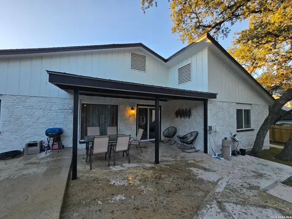 a view of a house with patio