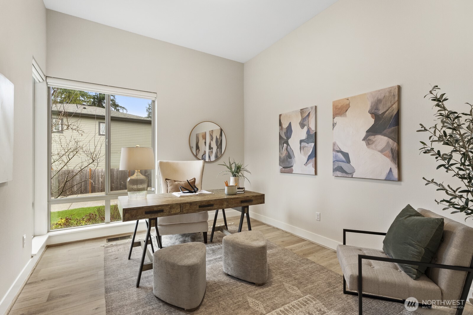 4526 327th Place Northeast Carnation, WA 98014 - Photo 12 of 36 a view of a workspace with furniture and a window